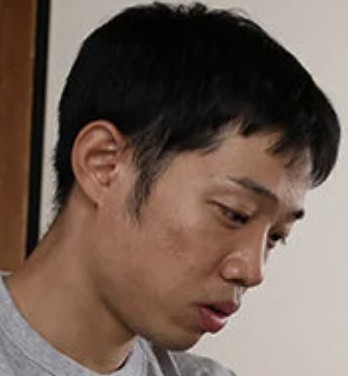 村田謙